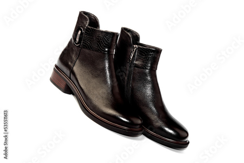 Women's demi-season high boots. classic black leather shoes with zipper.women's boots.summer shoes. on a white isolated background. high heels. 