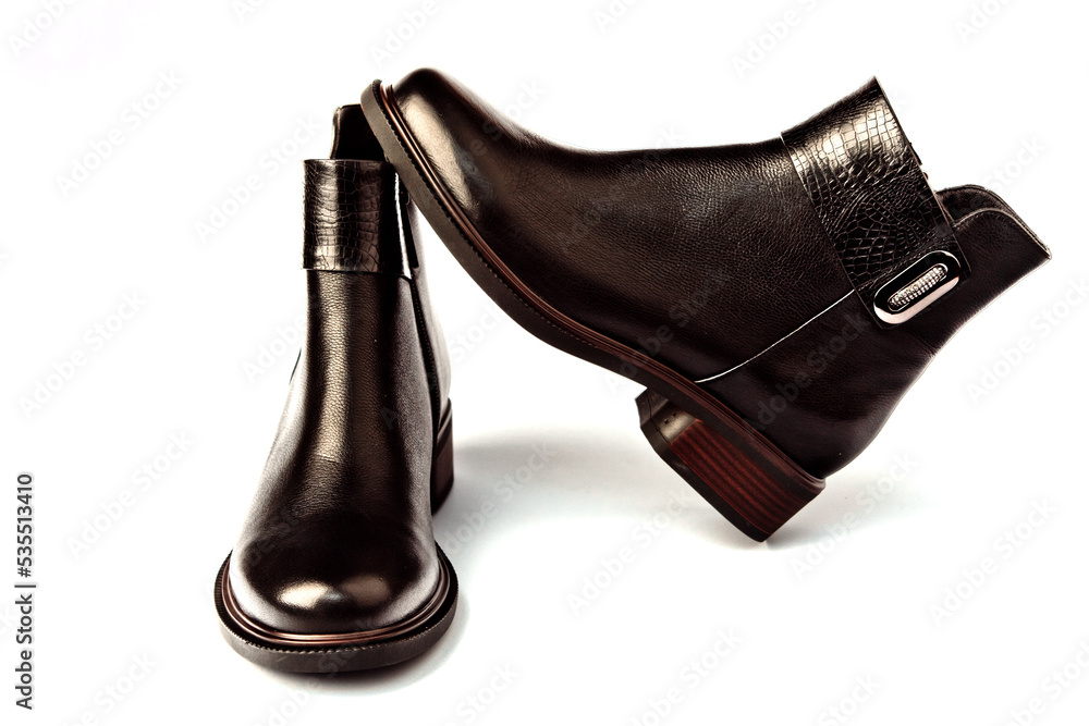 Women's demi-season high boots. classic black leather shoes with zipper.women's boots.summer shoes. on a white isolated background. high heels. Women's demi-season high boots. classic black leather shoes with zipper.women's boots.summer shoes. on a white isolated background. high heels.