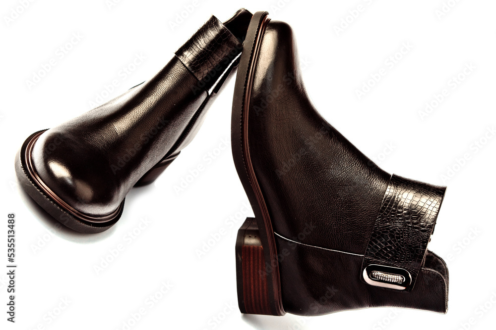 Women's demi-season high boots. classic black leather shoes with zipper.women's boots.summer shoes. on a white isolated background. high heels.
Women's demi-season high boots. classic black leather shoes with zipper.women's boots.summer shoes. on a white isolated background. high heels.
