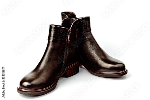 Women's demi-season high boots. classic black leather shoes with zipper.women's boots.summer shoes. on a white isolated background. high heels. 