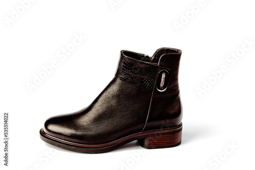 Women's demi-season high boots. classic black leather shoes with zipper.women's boots.summer shoes. on a white isolated background. high heels. 