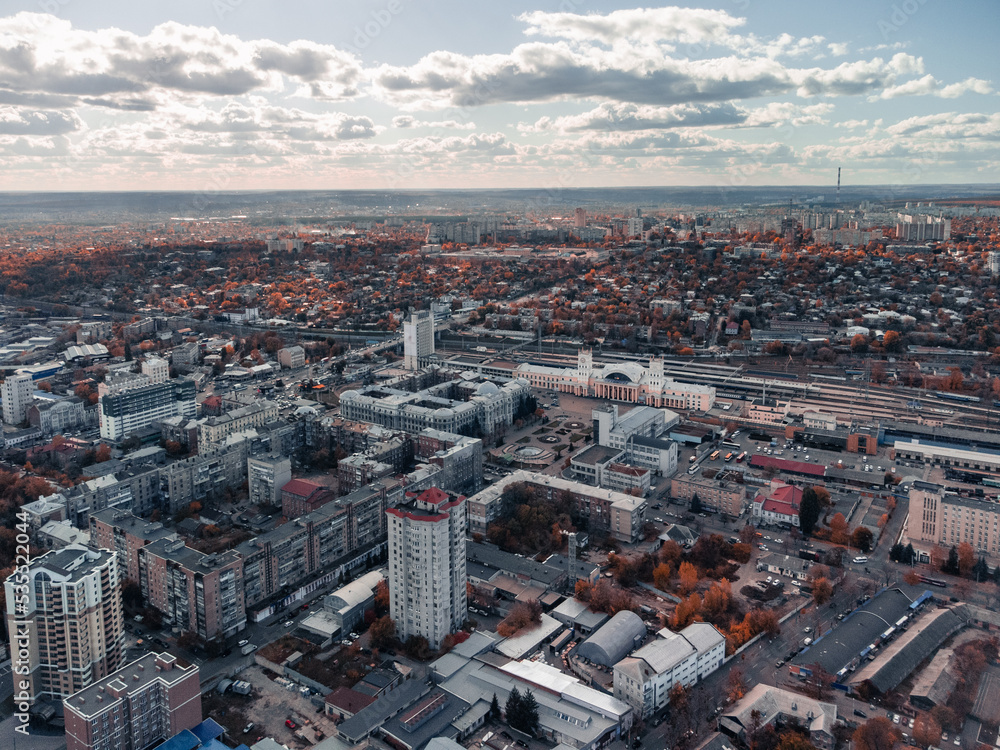 Aerial view on Central Kharkiv railway station Pivdennyy Vokzal in autumn, downtown city streets rooftop in Kharkiv, Ukraine