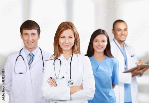 Medical team of doctors on hospital background