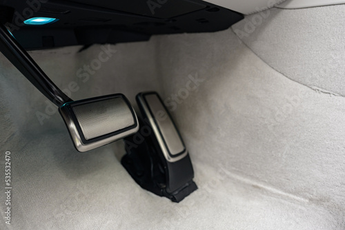 Brake and gas pedals of a luxury car