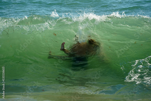 people swimming in atlantic ocean nantucket martha beach photo