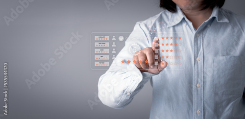 woman hand pointing with popup five star icon for feedback review satisfaction service, Customer service experience and business satisfaction survey. ideas design customer reviews.