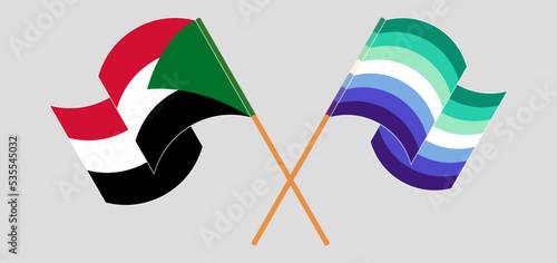 Crossed and waving flags of the Sudan and gay men pride
