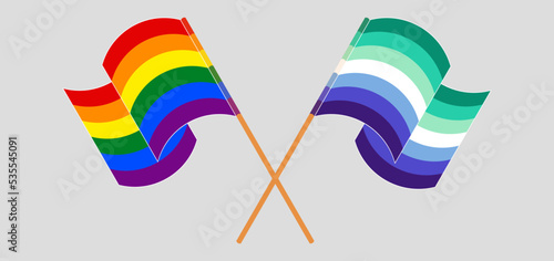 Crossed and waving flags of LGBTQ and gay men pride