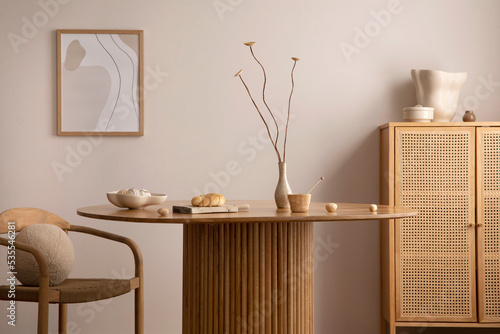 Foto Minimalist composition of dining interior with round wooden table, design chair, mock