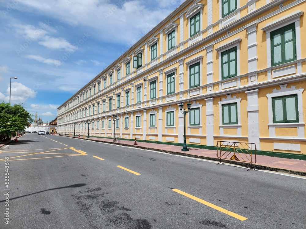 Fototapeta premium The walls of the Ministry of the Interior of Thailand have a European-style shape with striking yellow tones against the unique green window sills. It is a popular spot for tourists to take pictures.