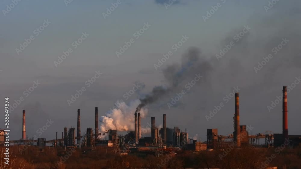 Industrial steam. Global warming. Smoking chimneys industry. Smoke plant footage. Air pollution concept. Industrial steam. Global warming. Smoking chimneys industry. Smoke plant footage. Air pollution concept.