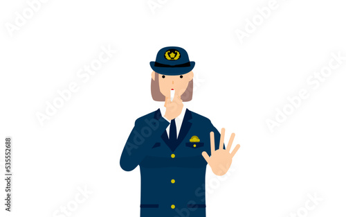 若い女性警官のポーズ、笛を吹いて制止する