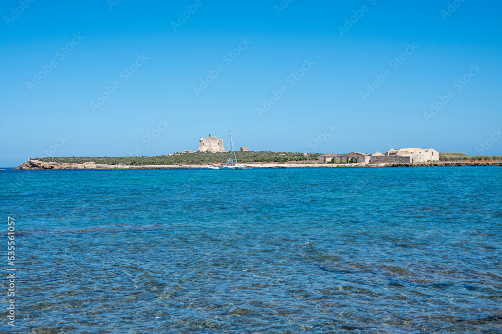 The island of Capo Passero in front of Portopalo where the waters of the two seas divide, the Ionian Sea and the Mediterranean Sea