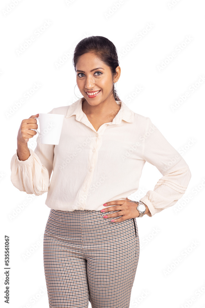 Pretty Young woman holding coffee cup isolated on white. Pretty Young woman holding coffee cup isolated on white.