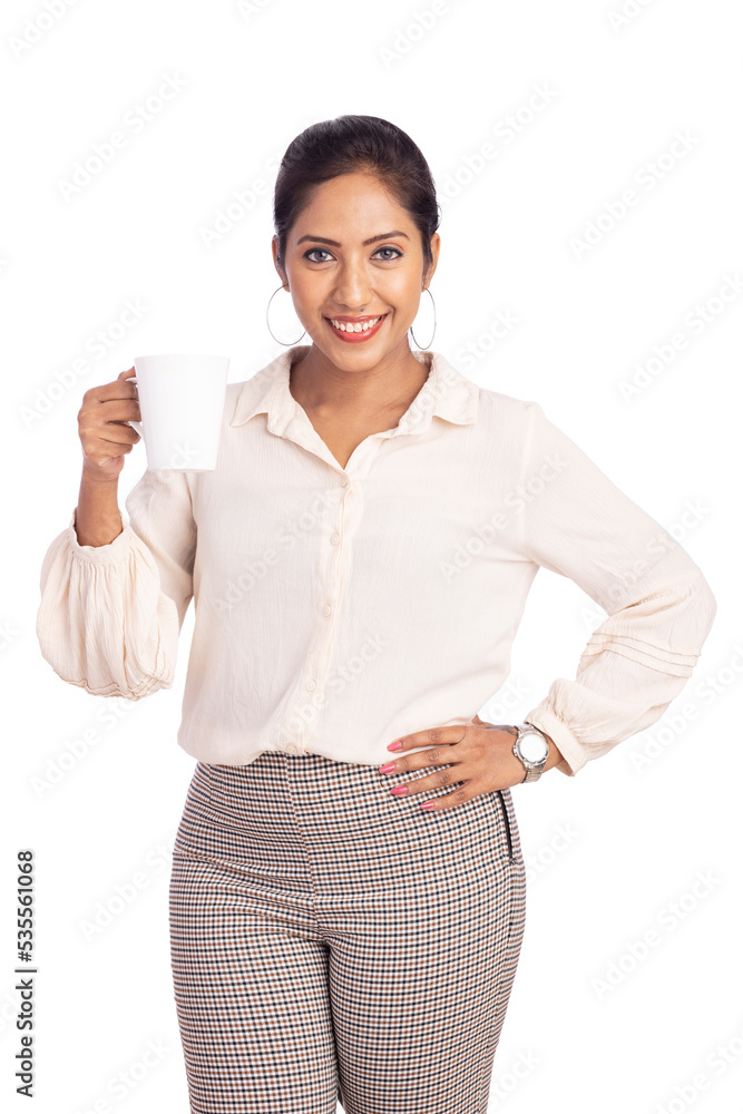 Pretty Young woman holding coffee cup isolated on white. Pretty Young woman holding coffee cup isolated on white.