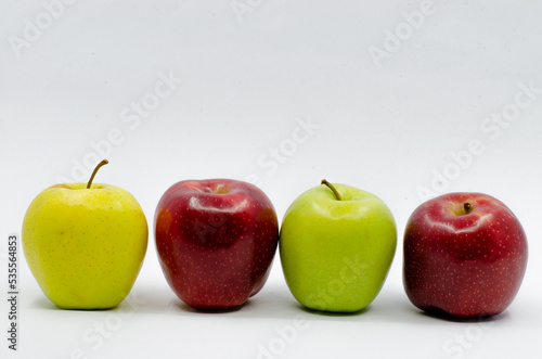 Red and Green colored Apples. Red and green apples isolated on a white background.
