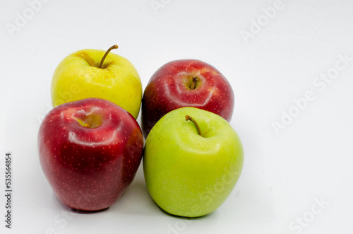 Red and Green colored Apples. Red and green apples isolated on a white background.
