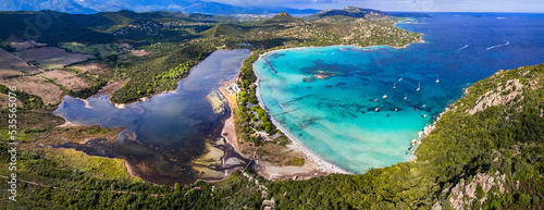 Best beaches of Corsica island - aerial panoramic view of beautiful Santa Giulia long beach with sault lake from one side and turquoise sea from other photo