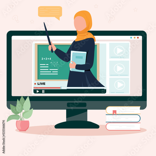 Muslim teacher near blackboard online lesson. Monitor with online education