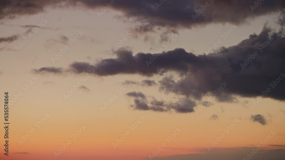 Dramatic clouds on sunset landscape. Optical zoom out from sky revealing storm river on golden hour Dramatic clouds on sunset landscape. Optical zoom out from sky revealing storm river on golden hour