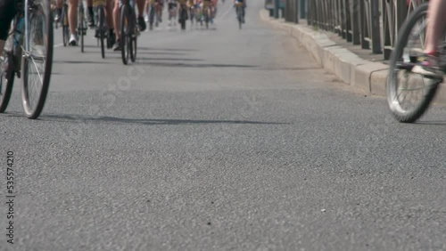 Wallpaper Mural Cyclists Speeding Along the Track. Many depersonalized cyclists move towards the camera and make a sharp turn. Shooting at a rate of 120fps Torontodigital.ca