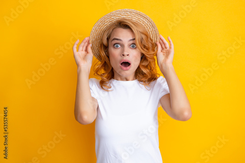 Redhead young beautiful excited amazed woman in straw hat. Summer mood. Expressive girl with surprised face. Portrait of young smiling cheerful caucasian pretty gild ginger hair.