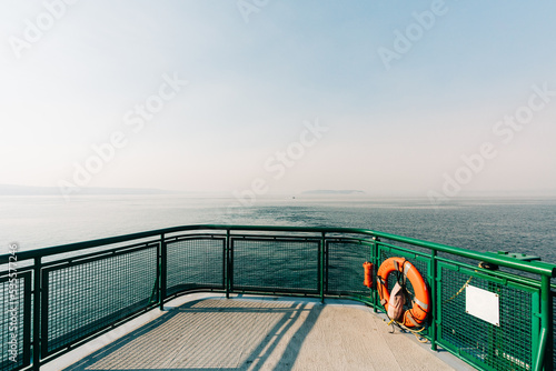 View from the front of a ferry with wildfire haze in the sky © Cavan