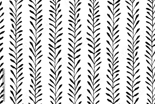 Hand crafted Black and white ethnic seamless pattern with botanical motifs. Vector background with brush ink dots. Simple floral pattern. Perfect for fabric, wrapping paper, textile, home decor