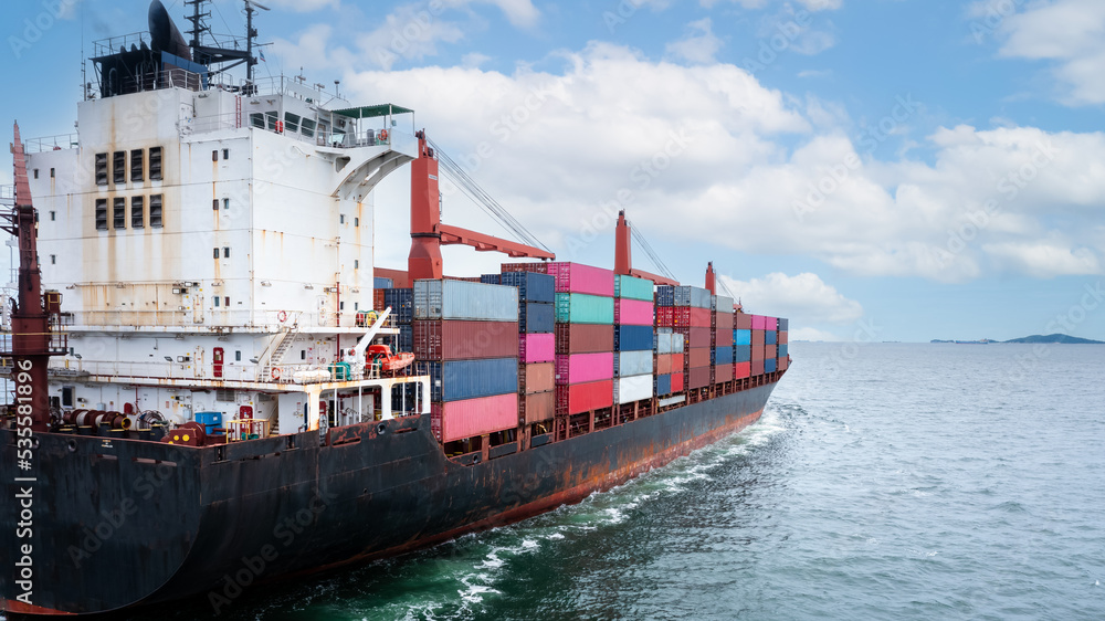 Naklejka premium Container ship transporting cargo logistic to import export goods internationally around the world, including Asia Pacific and Europe, business and industry service of goods logistic transportation