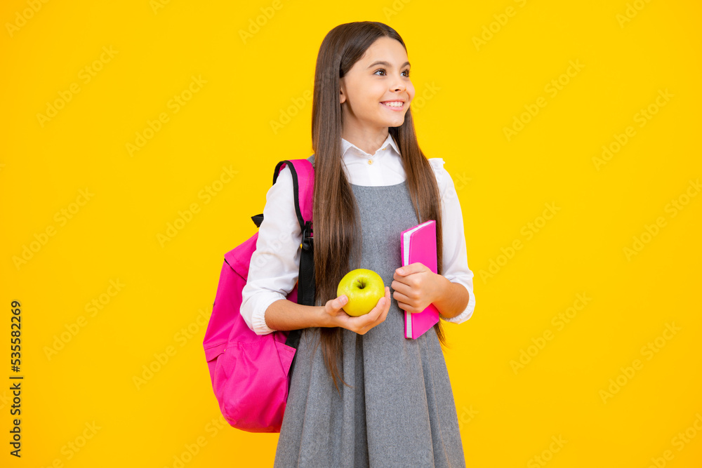 School teenage girl with book and copybook. Teenager schoolgirl student, isolated background. Learning and knowledge. Go study. Education concept. School teenage girl with book and copybook. Teenager schoolgirl student, isolated background. Learning and knowledge. Go study. Education concept.