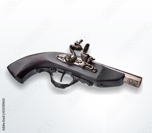 Old retro steel Revolver on the desk