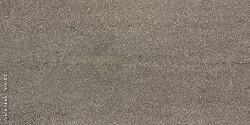 panorama view from above on surface texture of old asphalt road with cracks