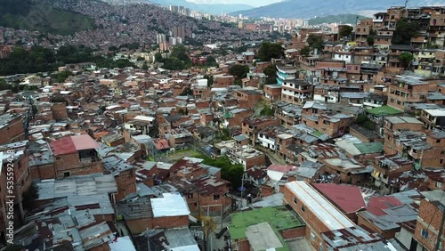 Medellin, Colombia, drone aerial view of Comuna 13 slums, favela. Once one of the most dangerous neighborhoods in world, Comuna 13 has reinvented itself in recent times and now is considered safe 