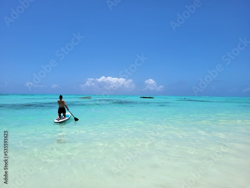 paddleboarding on the beach