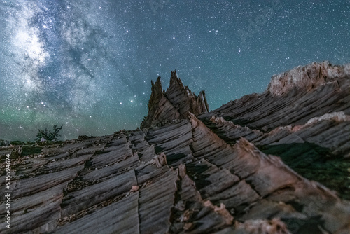 Milky Way above a delicate rock formation in Southern Utah photo
