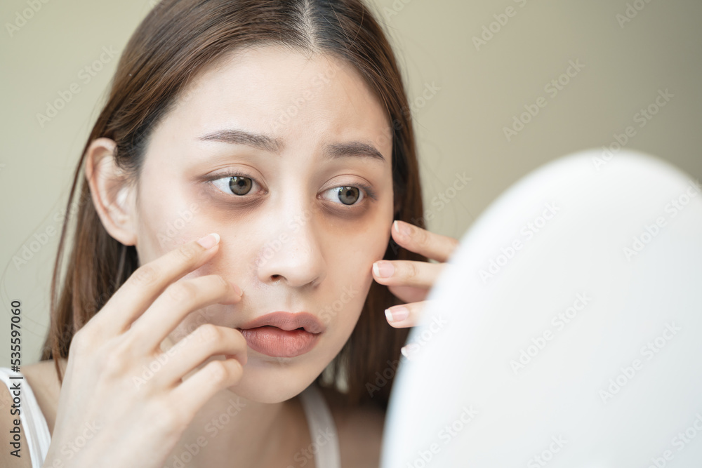 lack of sleep problem, Worried Asian young woman pointing finger at