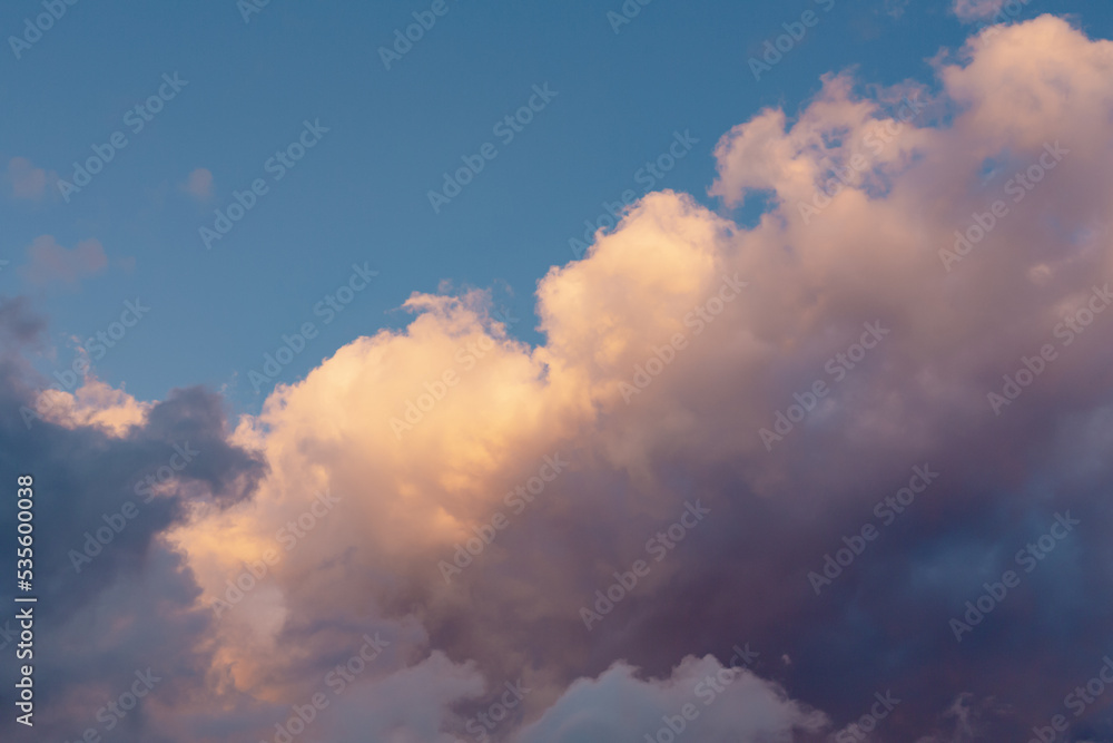 Sunset sky with dark clouds and orange light Sunset sky with dark clouds and orange light