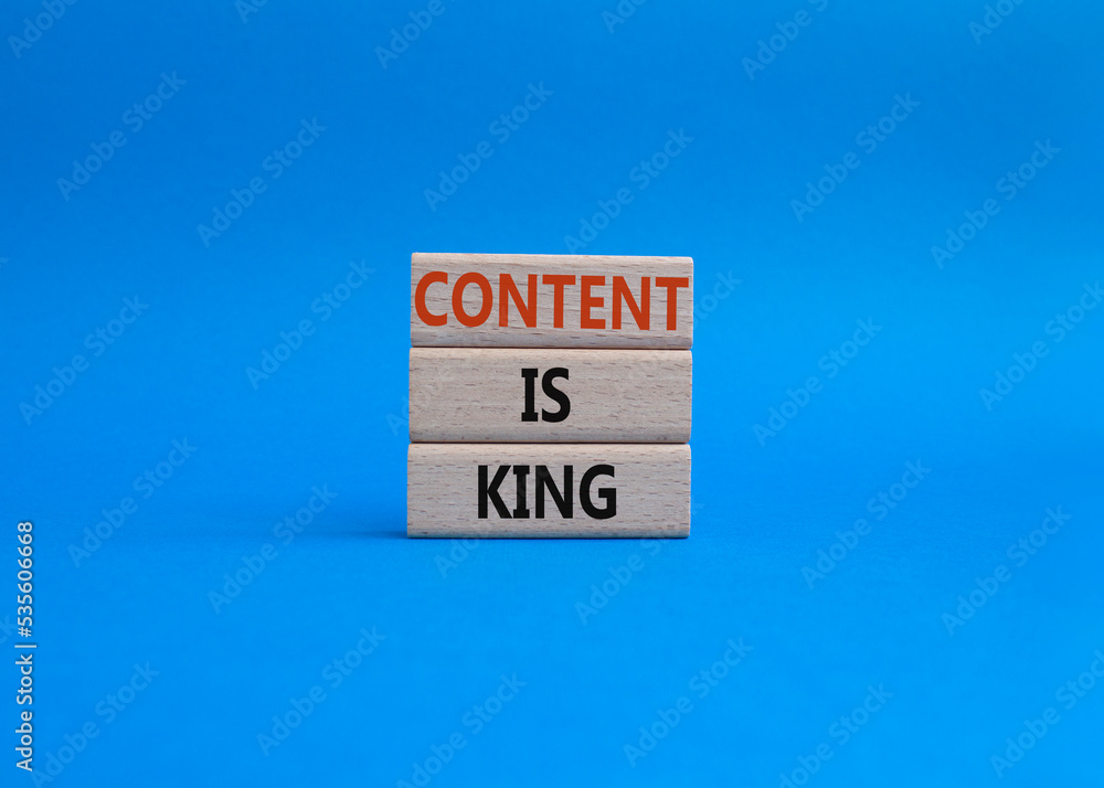 Content is king symbol. Concept words Content is king on wooden blocks. Beautiful blue background. Business and Content is king concept. Copy space. Content is king symbol. Concept words Content is king on wooden blocks. Beautiful blue background. Business and Content is king concept. Copy space.