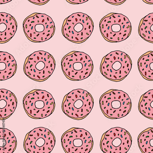 Seamless pattern with cute pink donuts on light pink background. Vector image.