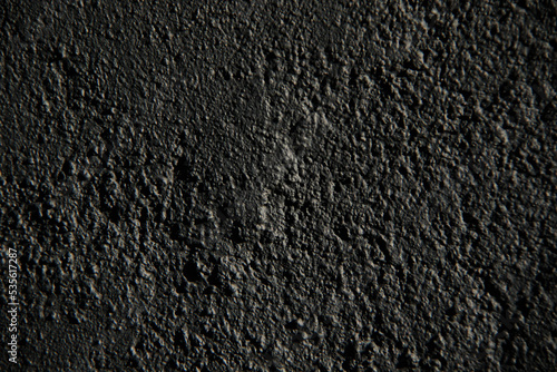 rough, black, textured blank wall background