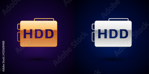 Gold and silver Hard disk drive HDD icon isolated on black background. Vector