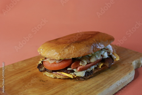 TORTA DE PIERNA CON SALCHICA MILANESA QUESO AMARILLO VERDURAS MÉXICO  photo