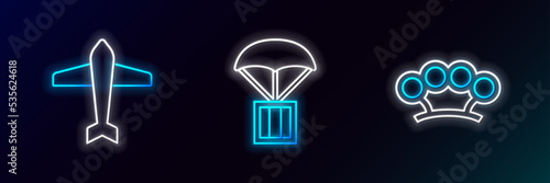 Set line Brass knuckles, Jet fighter and Airdrop box icon. Glowing neon. Vector