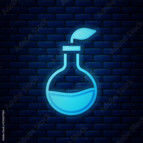 Glowing neon Plant breeding icon isolated on brick wall background. Plants growing in the test tubes. Organic food ,agriculture and hydroponic. Vector