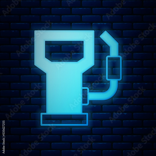 Glowing neon Petrol or gas station icon isolated on brick wall background. Car fuel symbol. Gasoline pump. Vector
