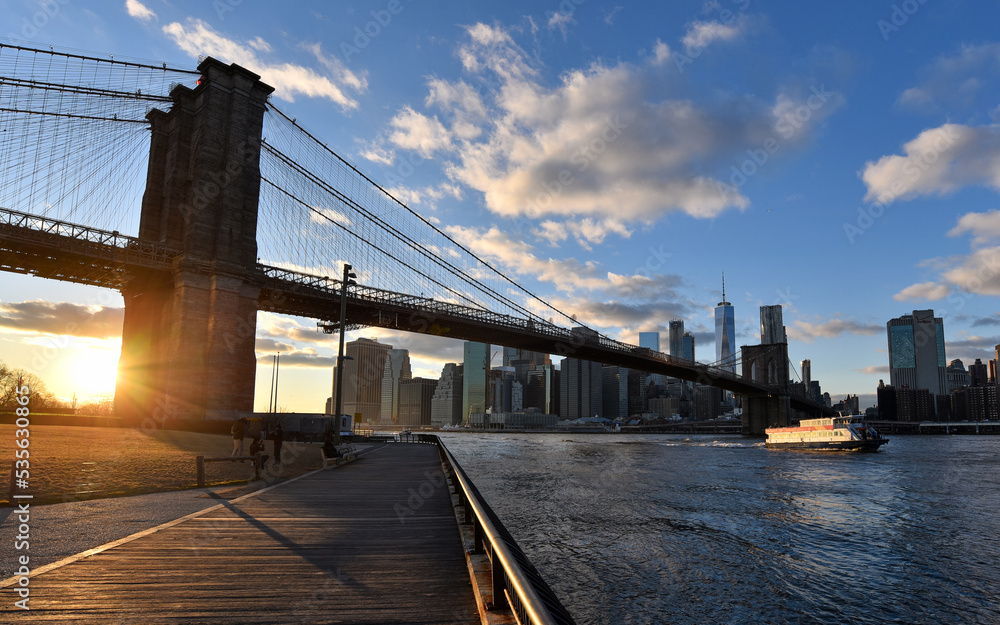Fabulous view of the Brooklyn bridge and New York skyline at sunset.