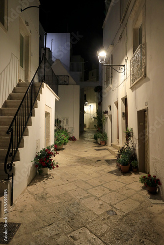 Fototapeta Naklejka Na Ścianę i Meble -  Historic district of Locorotondo at night. Locorotondo is an Italian municipality of about 14000 inhabitants in the metropolitan city of Bari, Apulia region.