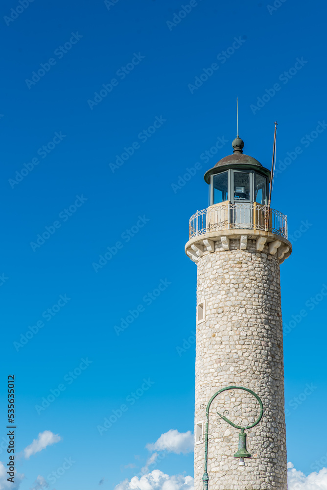 Lighthouse at the city of Patras on a beautiful day very colorful, Achaia, Peloponnese, Greece