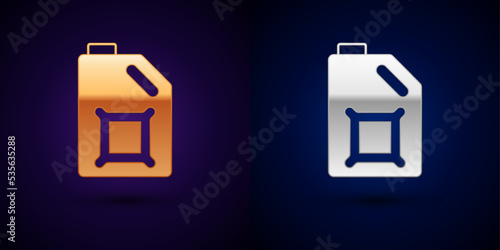 Gold and silver Canister for motor machine oil icon isolated on black background. Oil gallon. Oil change service and repair. Engine oil sign. Vector