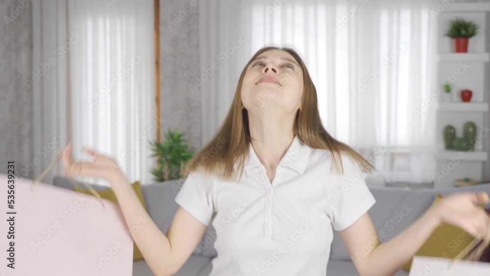 Young girl dancing with shopping bags.
Young girl looking at camera with shopping bags is dancing and happy.
Young girl dancing with shopping bags.
Young girl looking at camera with shopping bags is dancing and happy.